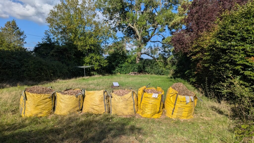 Six bags of fresh woodchip left for the customer's garden in Guilden Sutton